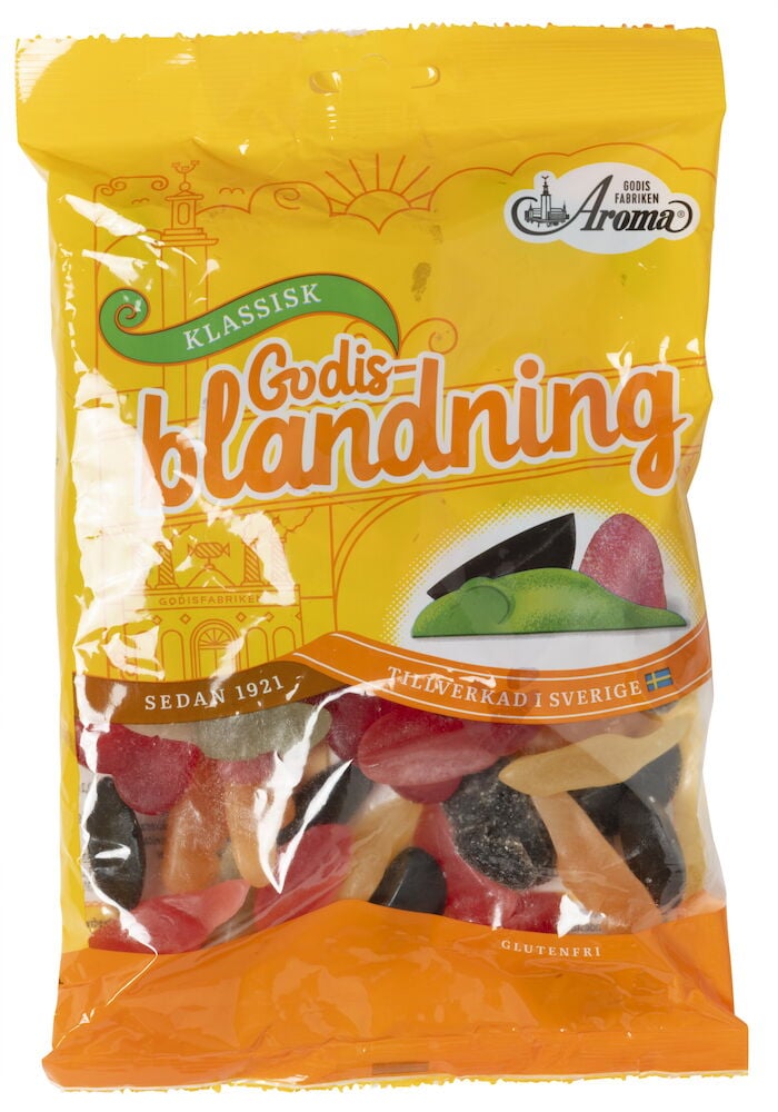 Påse med färgglada gelégodisar och lakritsbitar.