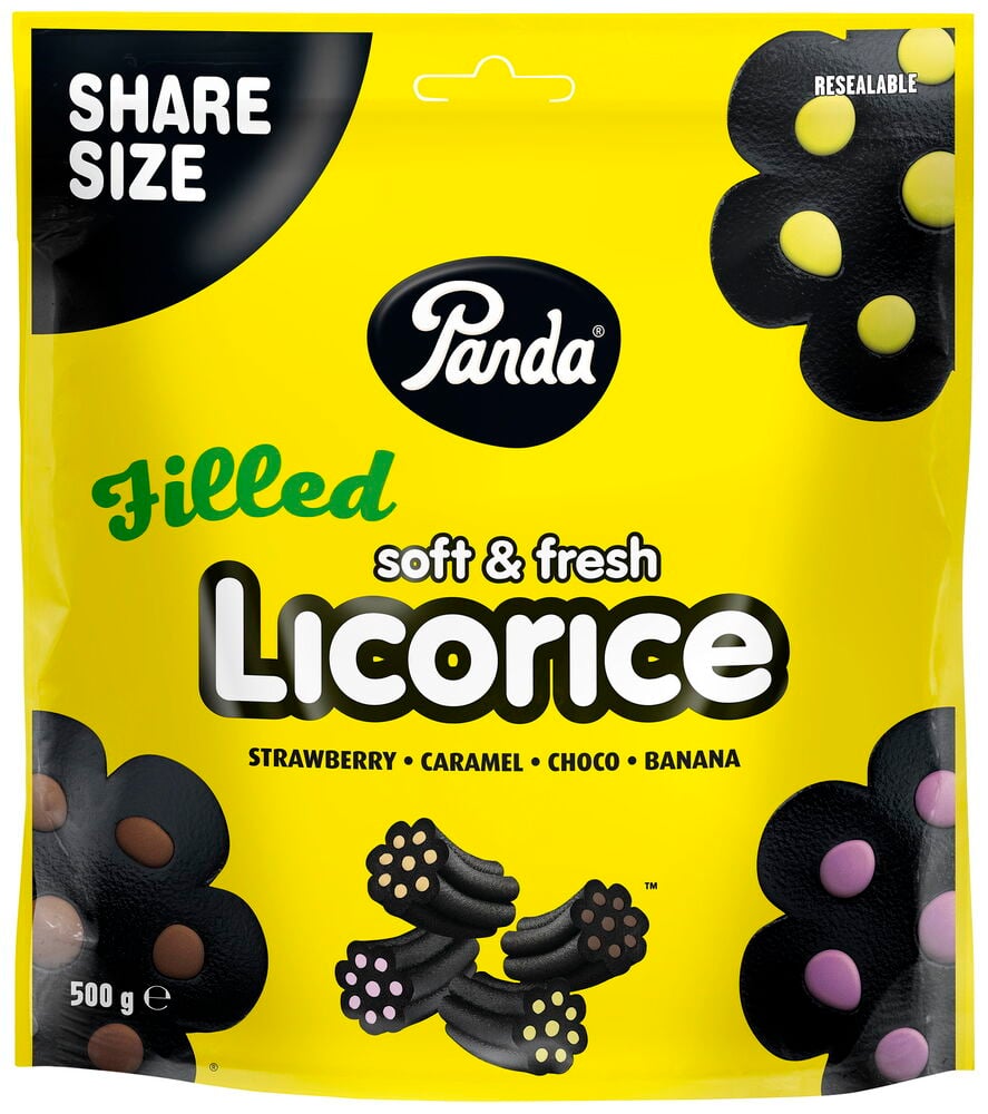 Gelbe Tüte mit schwarzen gefüllten Lakritzstücken.