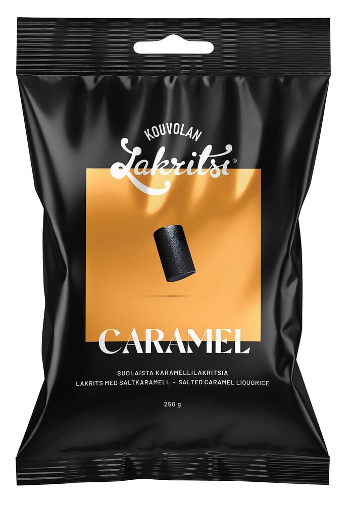 Musta pussi Kouvolan Lakritsi Karamelli-merisuola karkkia, 250 g, oranssilla grafiikalla ja mustalla karkilla.