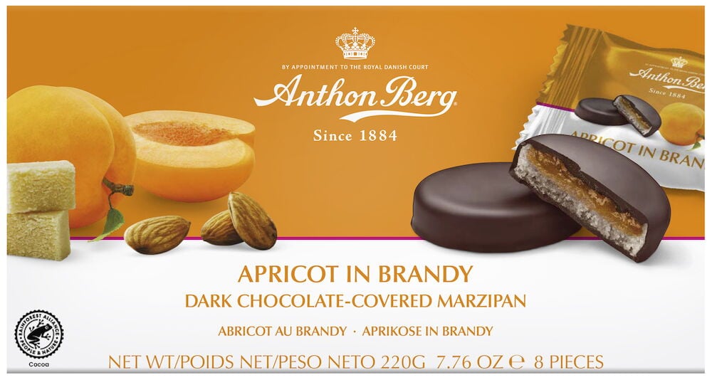 Chokladöverdragna marsipanbitar med aprikos och mandel.