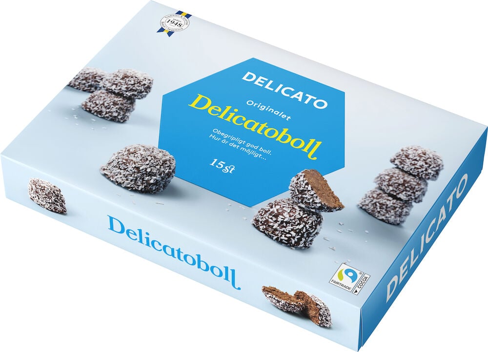 En blå kartong med kokosrullade chokladbollar.