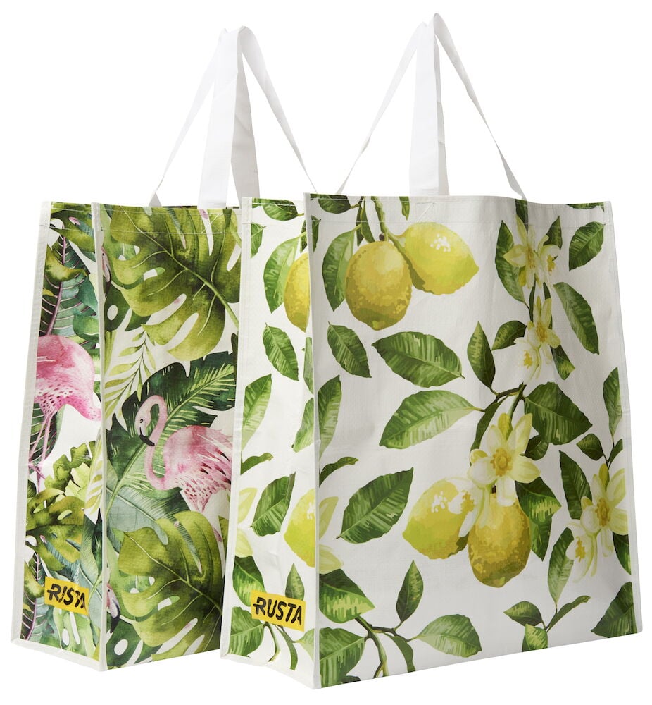 Kaksi Ostoskassi Large Kesä: toisessa sitruunoita ja lehtiä, toisessa flamingoja ja trooppisia lehtiä.