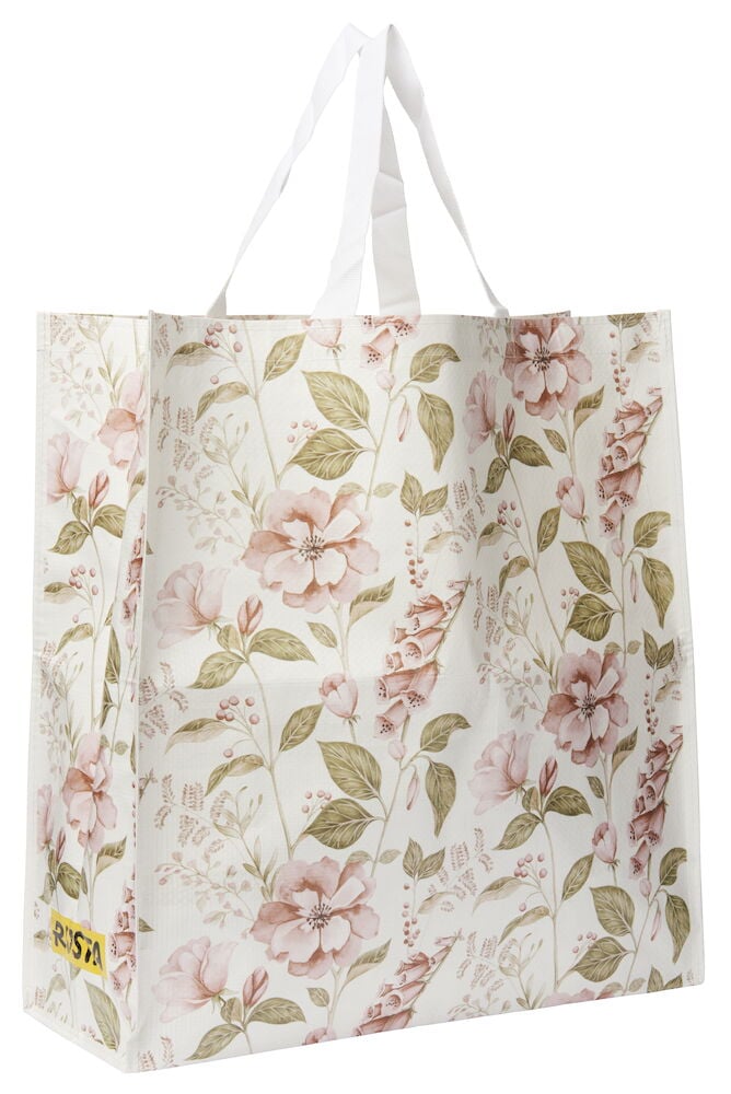 Handlepose Large Spring med hvit bakgrunn, detaljert rosa og grønt blomstermønster og hvite håndtak.