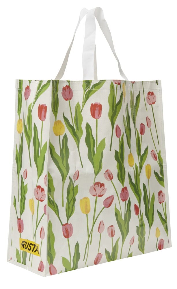 En hvit Handlepose Large Spring med mønster av røde, rosa og gule tulipaner, og hvite håndtak.