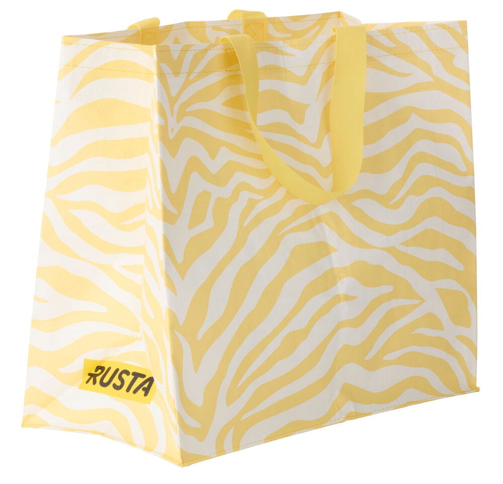 Ostoskassi Medium Kevät, keltainen ja valkoinen seeprakuvioinen uudelleenkäytettävä ostoskassi keltaisilla kahvoilla.