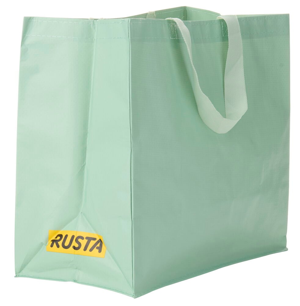 Vaaleanvihreä Ostoskassi Medium Kesä kahvoilla ja keltaisella RUSTA-logolla, edestä ja sivulta kuvattuna.