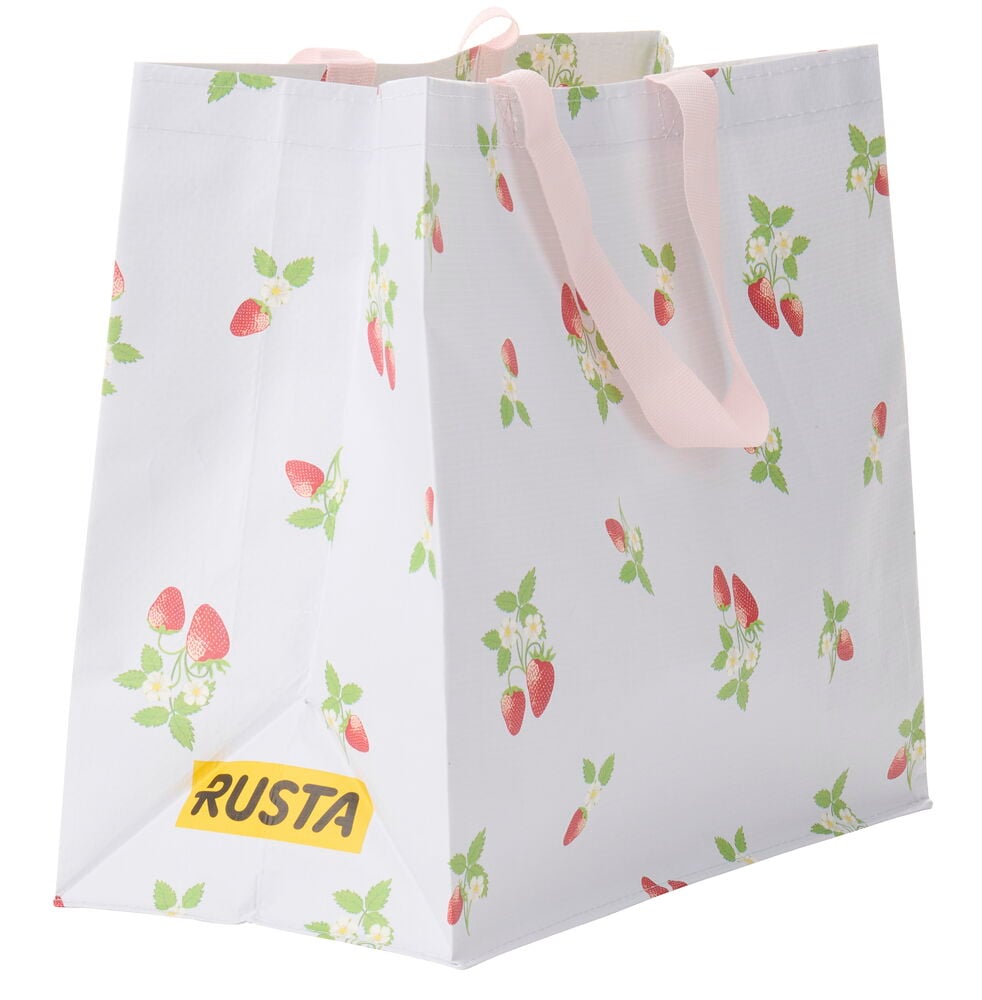 Valkoinen Ostoskassi Medium Kesä, jossa on vaaleanpunaiset kahvat ja mansikka- ja kukkakuvio.