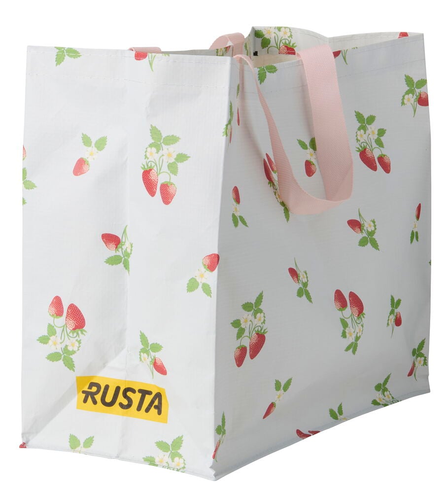 Einkaufstasche Medium Sommer, weiß mit rotem Erdbeermuster, rosa Griffen und Rusta-Logo.