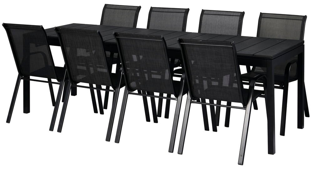 Musta jatkettava pöytä kahdeksalla yhteensopivalla tuolilla.