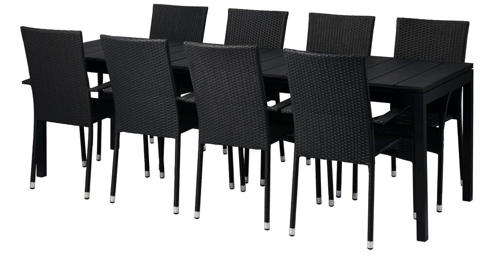 Musta jatkettava ruokapöytä, jossa on kahdeksan yhteensopivaa tuolia.