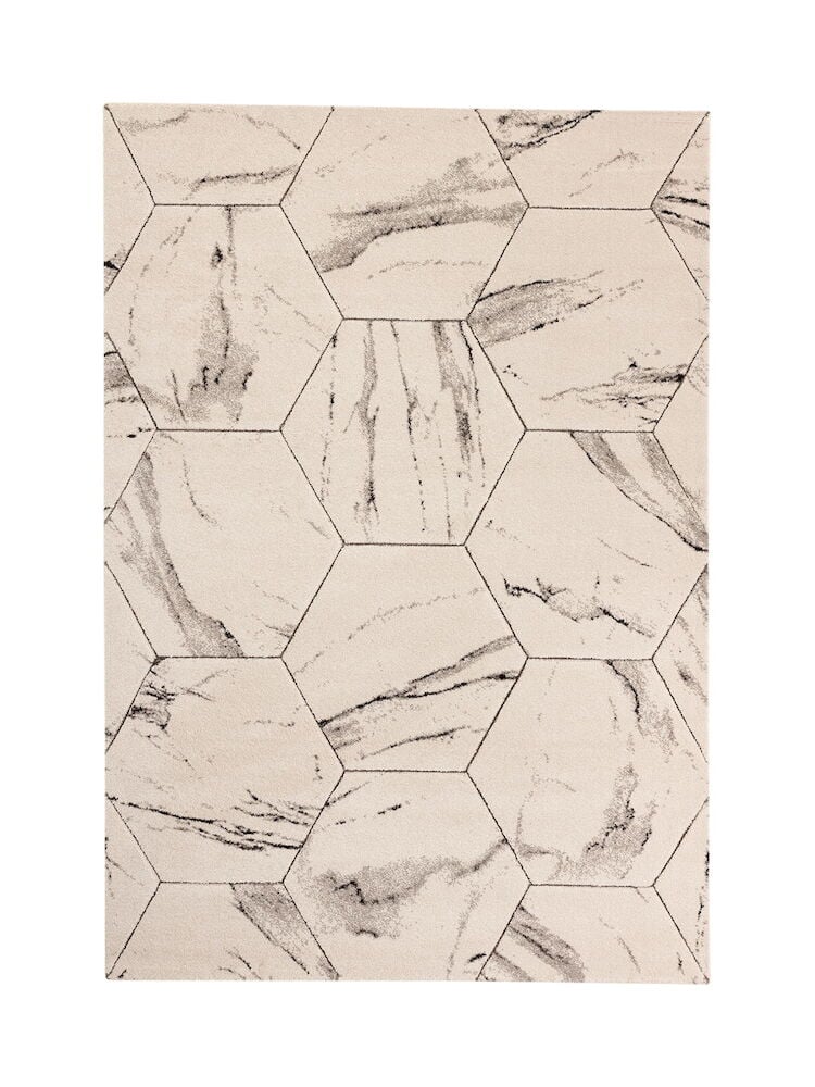 Vit matta med hexagonmönster och marmoreffekt.