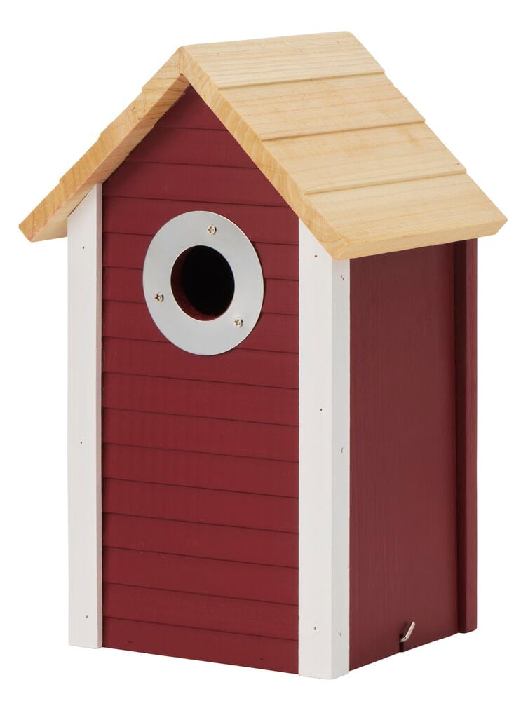 Punainen linnunpönttö puusta, jossa on valkoinen kulma.