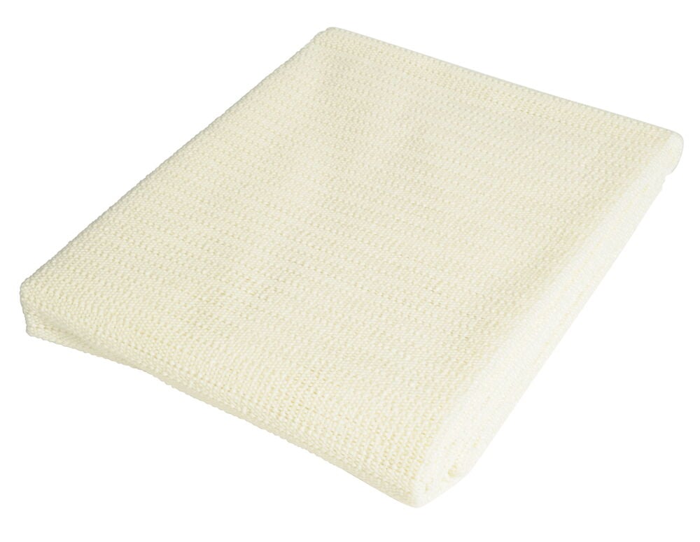 Beige vikt halkskyddsmatta i PVC-material.