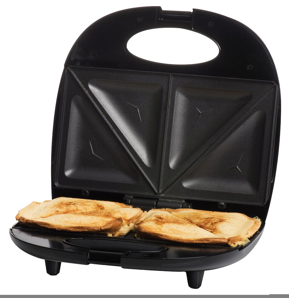 Öppen smörgåsgrill med gyllenbruna toastskivor inuti.