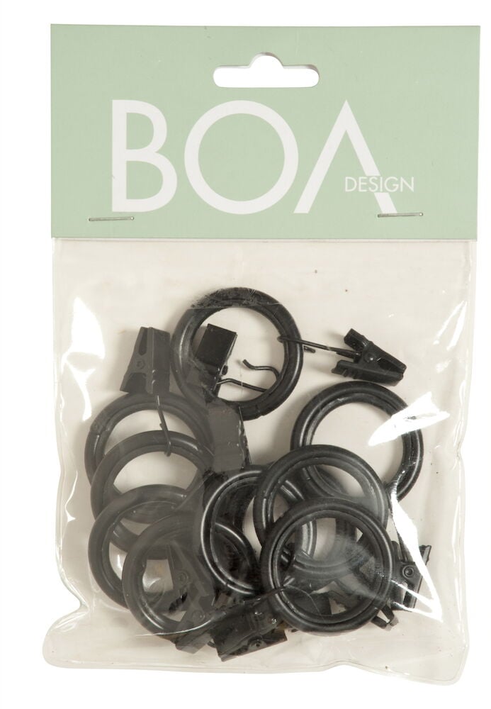 Mustat metalliset verhorenkaat pienillä klipseillä.