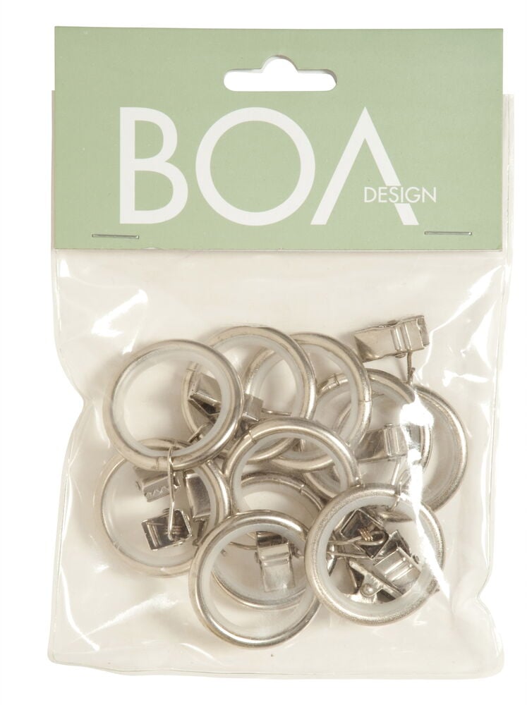 Kymmenen hopeanväristä verhorengasta muovipussissa.