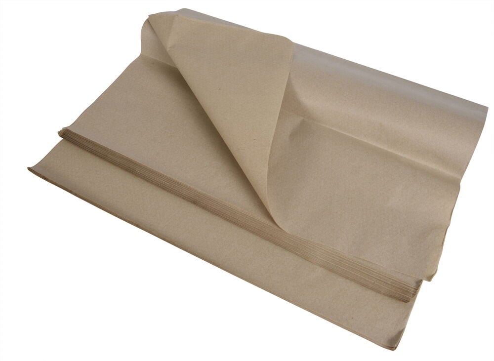 Ruskea silkkipaperi taitettu useiksi ohuiksi arkeiksi.