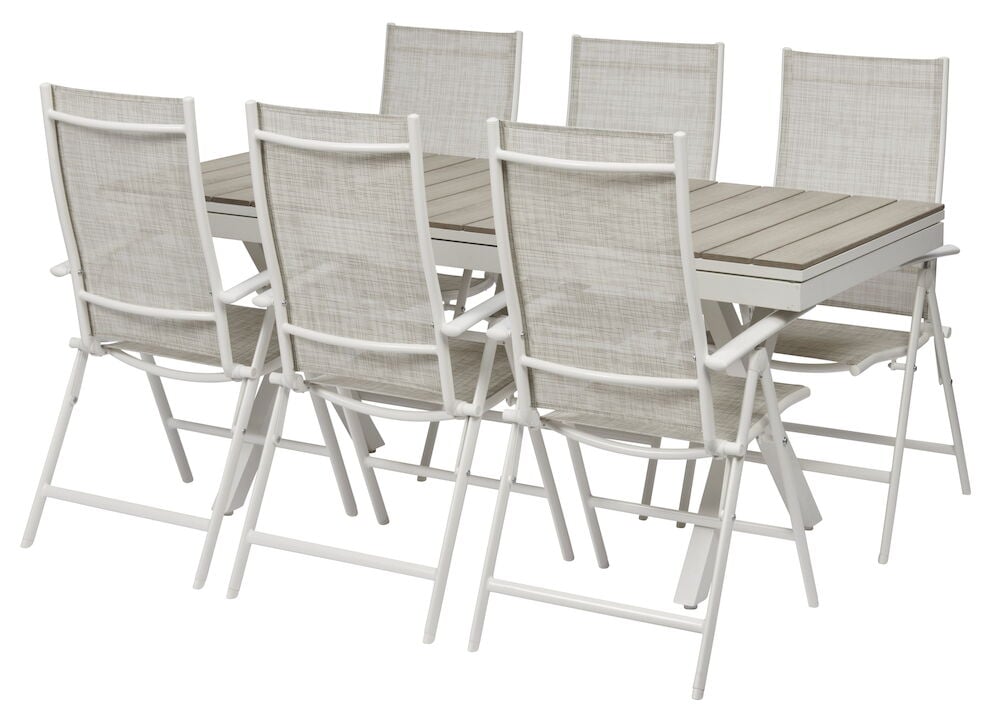 Vitt utdragbart bord med sex matchande stolar.