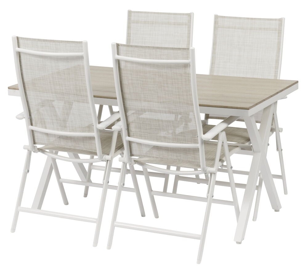 Vitt rektangulärt bord med fyra vita stolar.