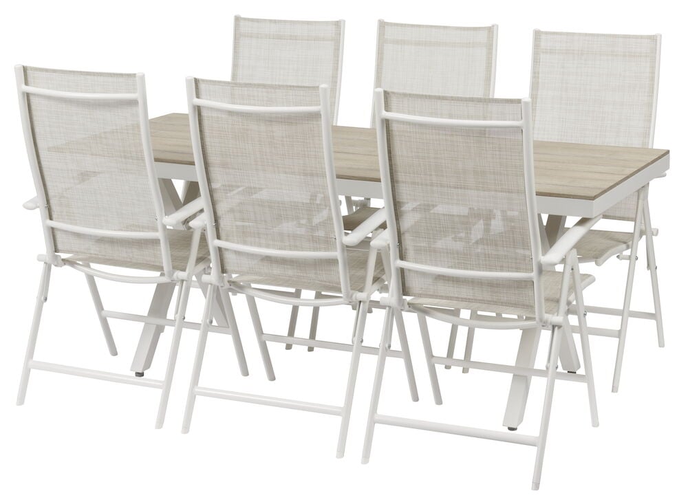 Vit matgrupp med bord och sex stolar.