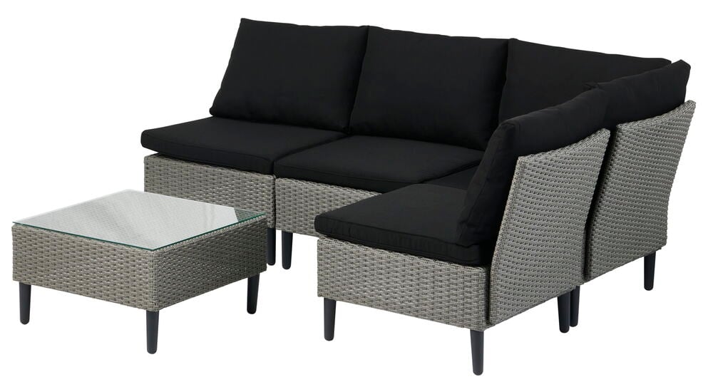 Rektangulær glasskive på grått salongbord utendørs.