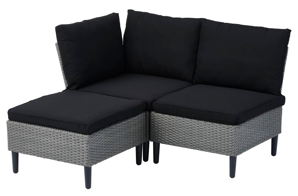 Eckmodul aus grauem Polyrattan mit schwarzen Kissen.