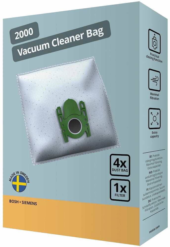 En dammsugarpåse med grön plastdel på förpackning.