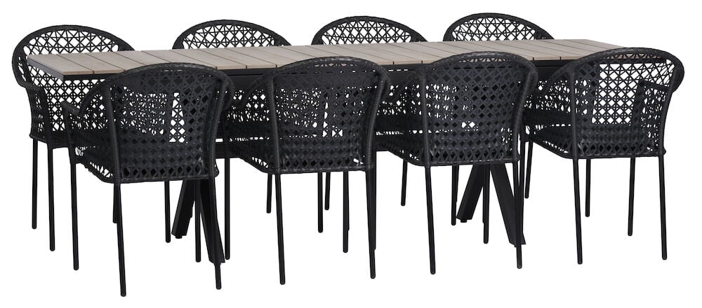 Schwarzer ausziehbarer Esstisch mit acht schwarzen Stühlen.