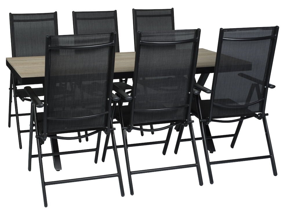 Musta ruokapöytä, jonka ympärillä on kuusi mustaa tuolia.